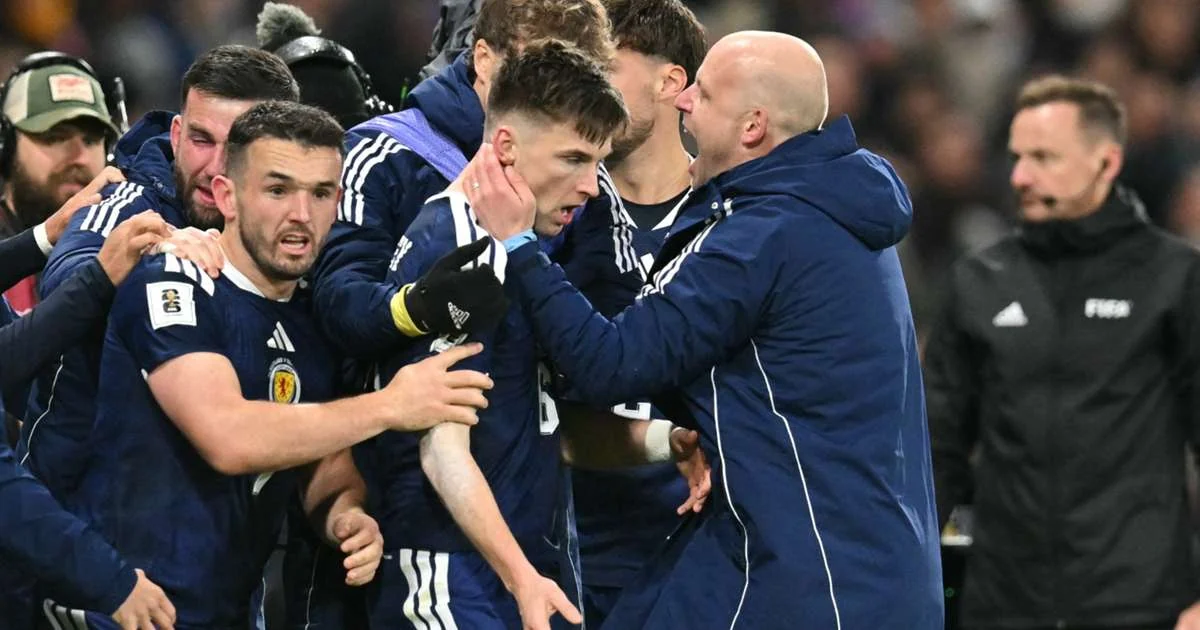 Scotland players celebrating qualification for the World Cup